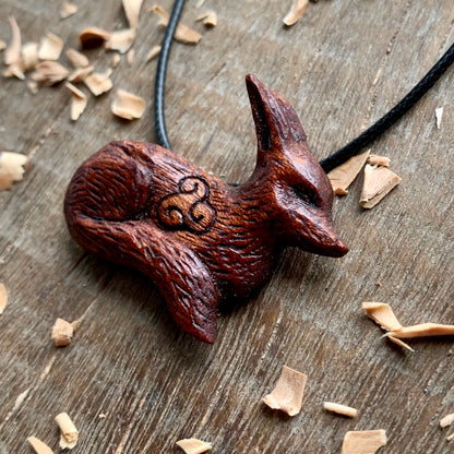 Hand Carved Fox Triskelion Pendant