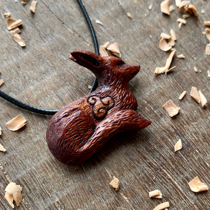 Hand Carved Fox Triskelion Pendant