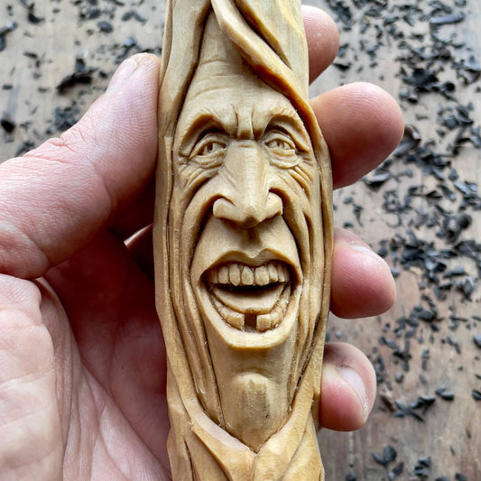 Happy Spirit Basswood Sculpture