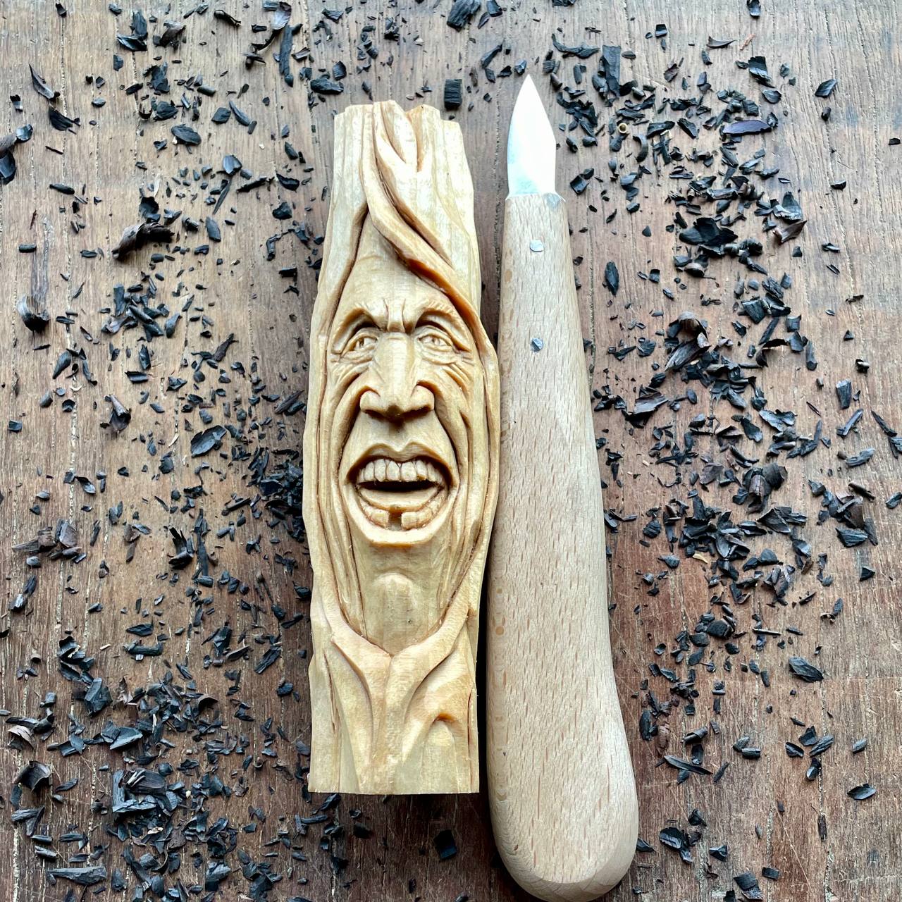 Happy Spirit Basswood Sculpture