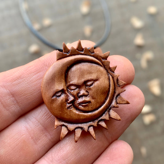 Sun And Moon Apricot Wood Pendant