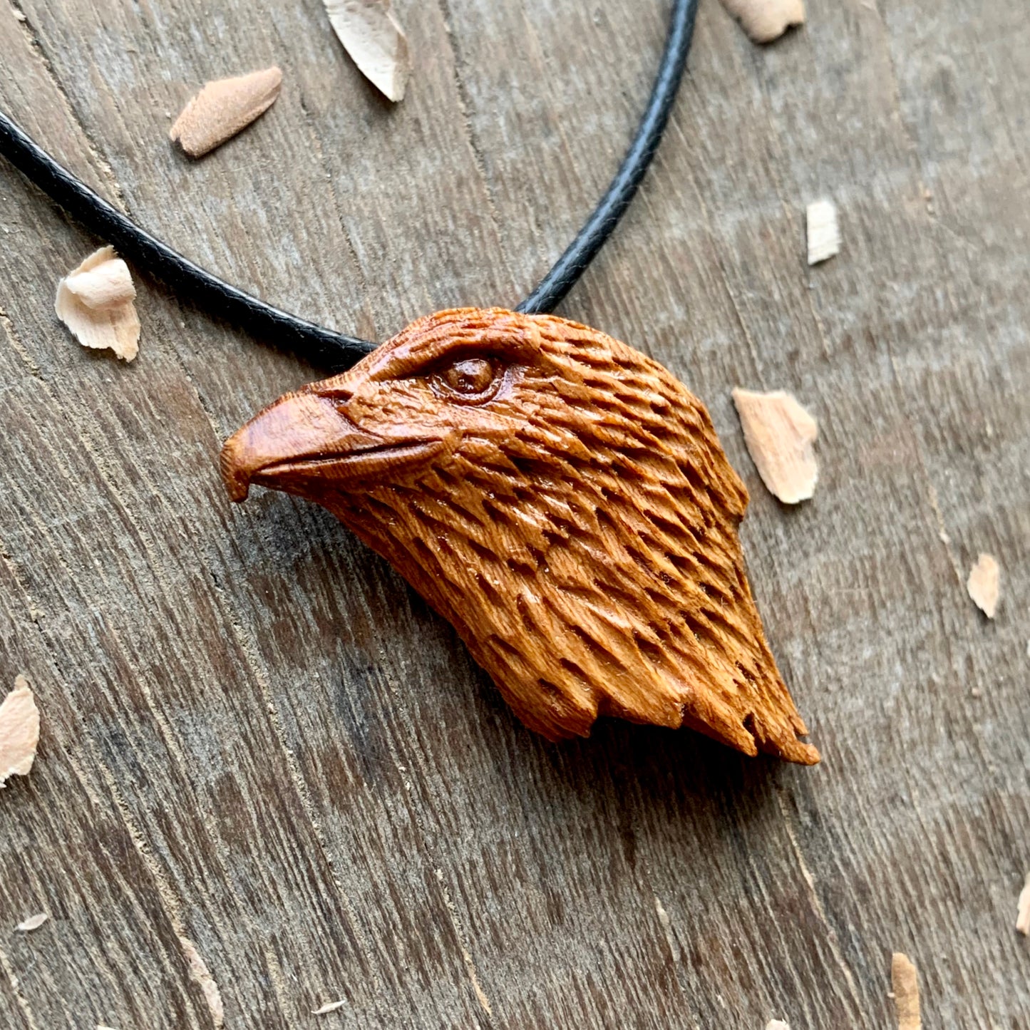 Hawk’s Head Almond Wood Pendant