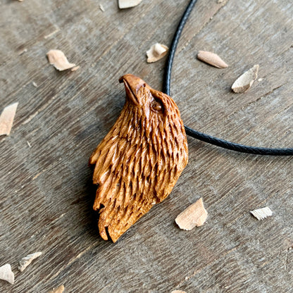 Hawk’s Head Almond Wood Pendant