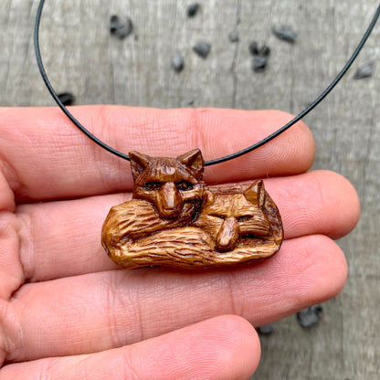 Two Lying Foxes Pendant, Plum Wood Necklace