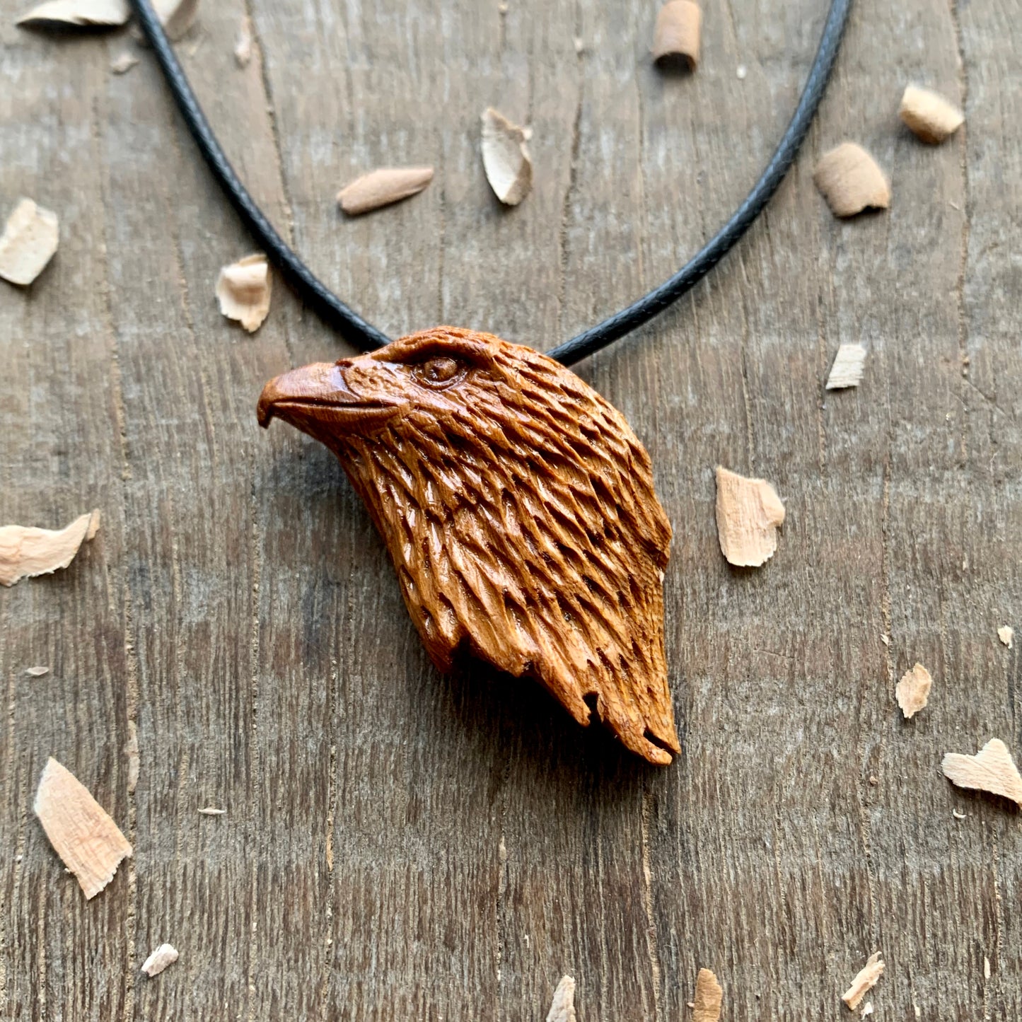 Hawk’s Head Almond Wood Pendant