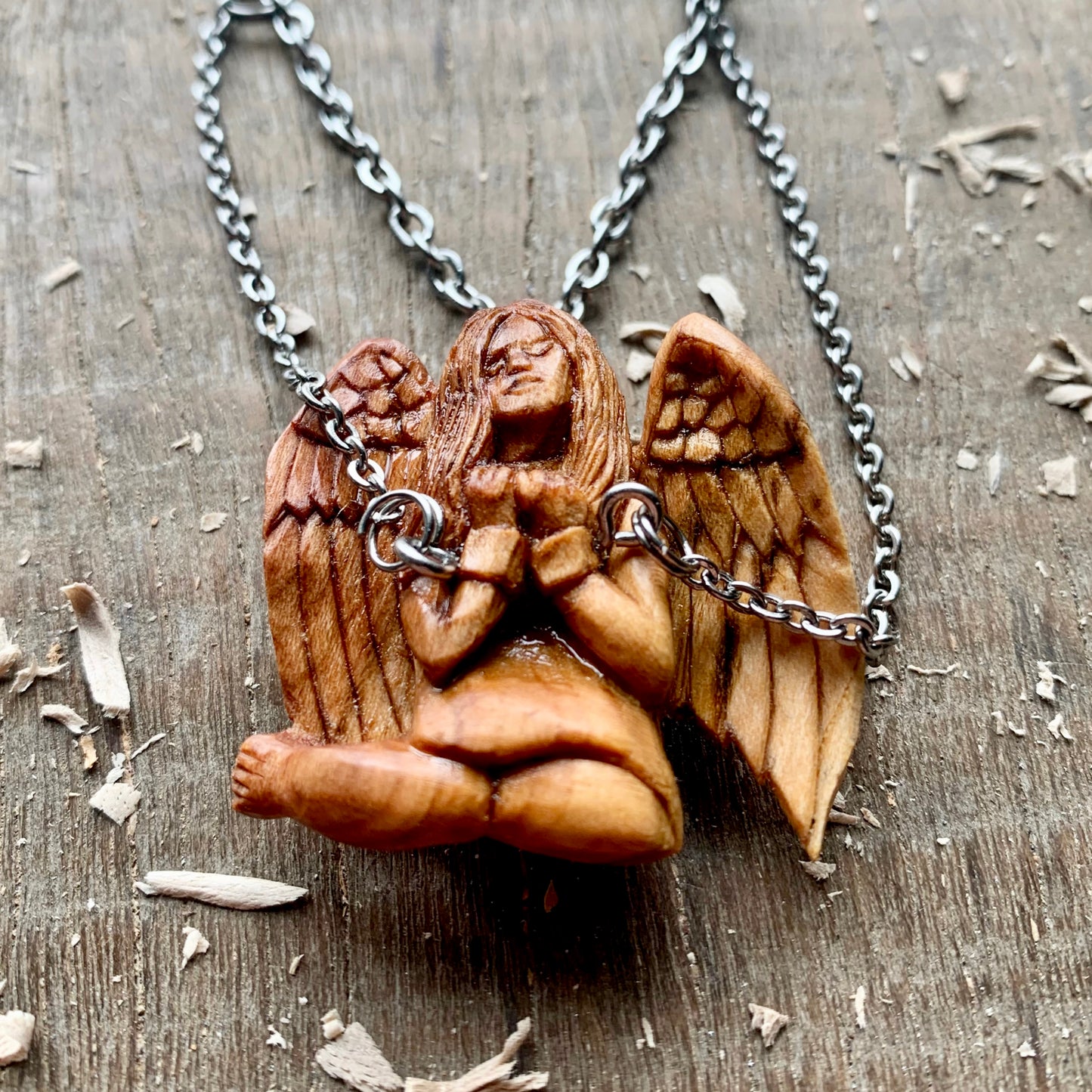 "Angel in Chians" Plum Wood Pendant