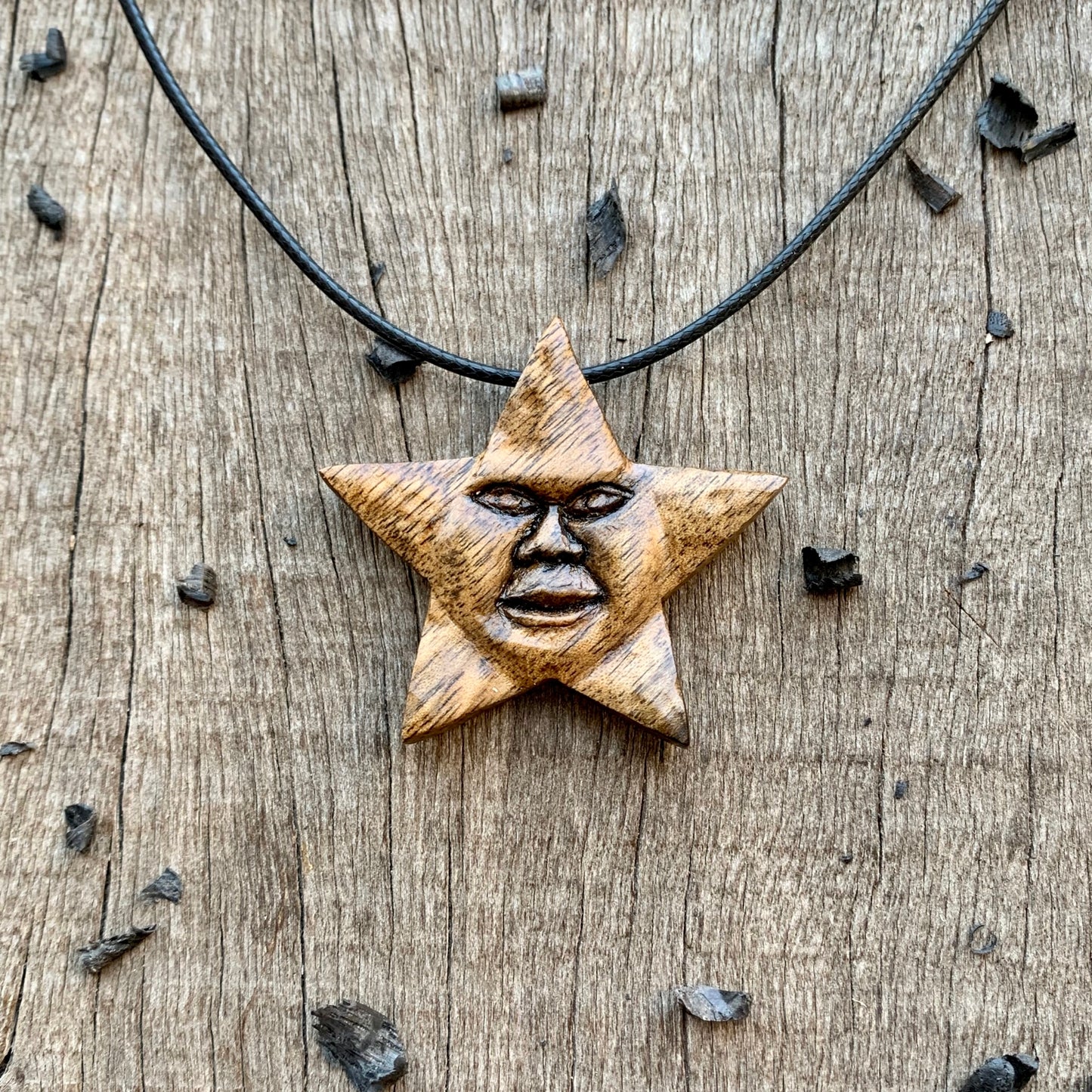 Star With Face Pendant